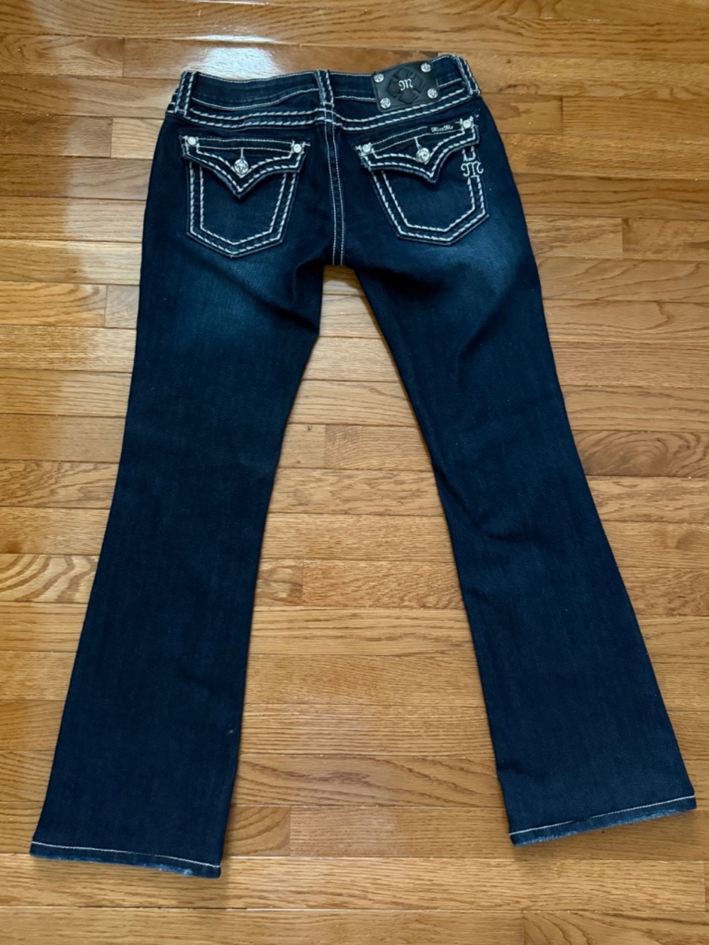 Miss Me Boot Cut Thick Stitch Jean.  Worn only a few times, looks new.   Size 28